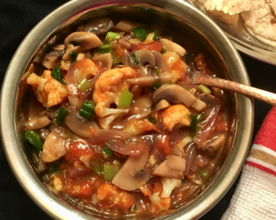 Make cauliflower stew with mushrooms at home,