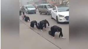 Employees forced to crawl on road 