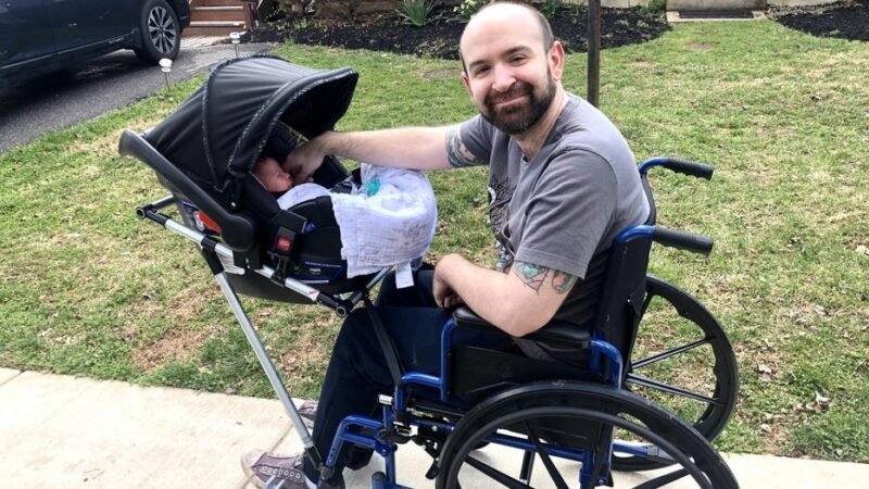 Man has A Kid though Bound To A Wheelchair