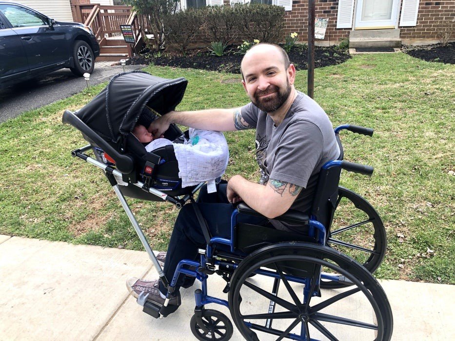 Man has A Kid though Bound To A Wheelchair